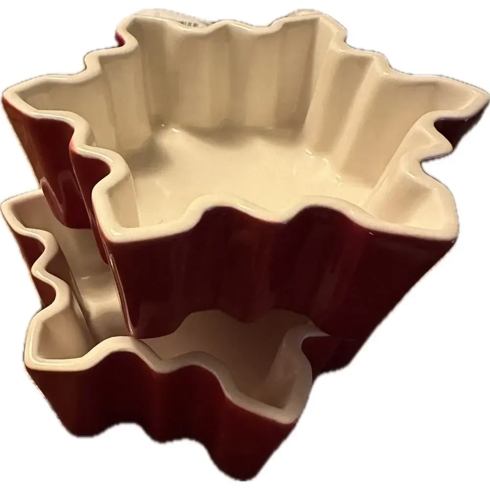 Crate & Barrel pair of red and white ceramic snowflake shaped bowls